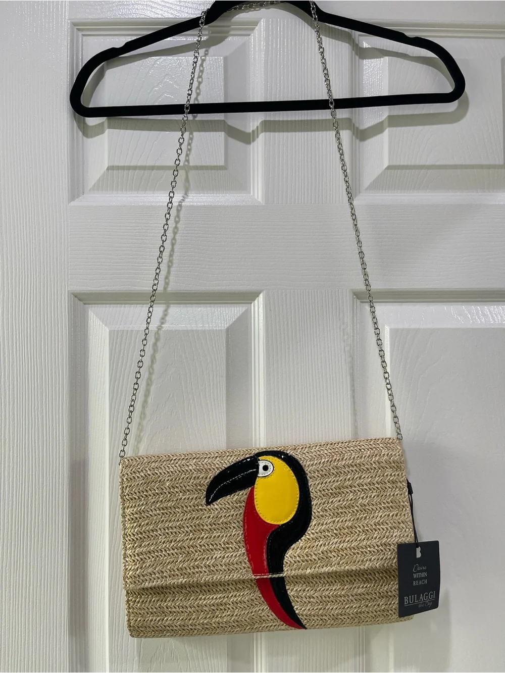 Bulaggi Natural Straw Crossbody Bag with Colorful Toucan Patch